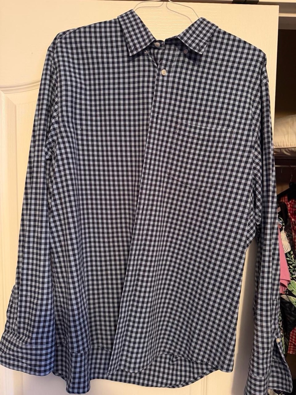 Multiple men’s dress shirts